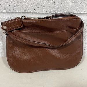 Small brown coach wristlet with open pocket?